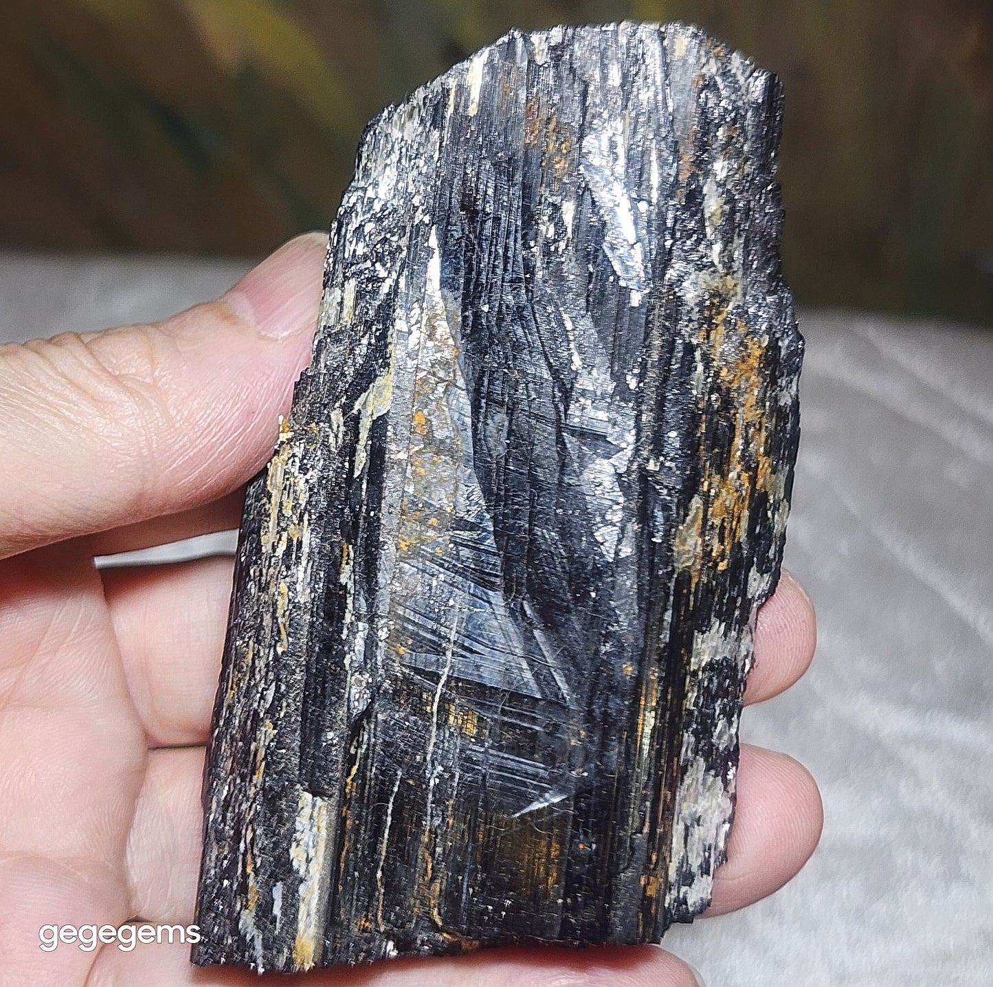 231g Raw Black Tourmaline with some silvery Mica co-growth, very reflective surface handheld decor display 天然黑碧玺原石带云母片超亮皮手把摆件