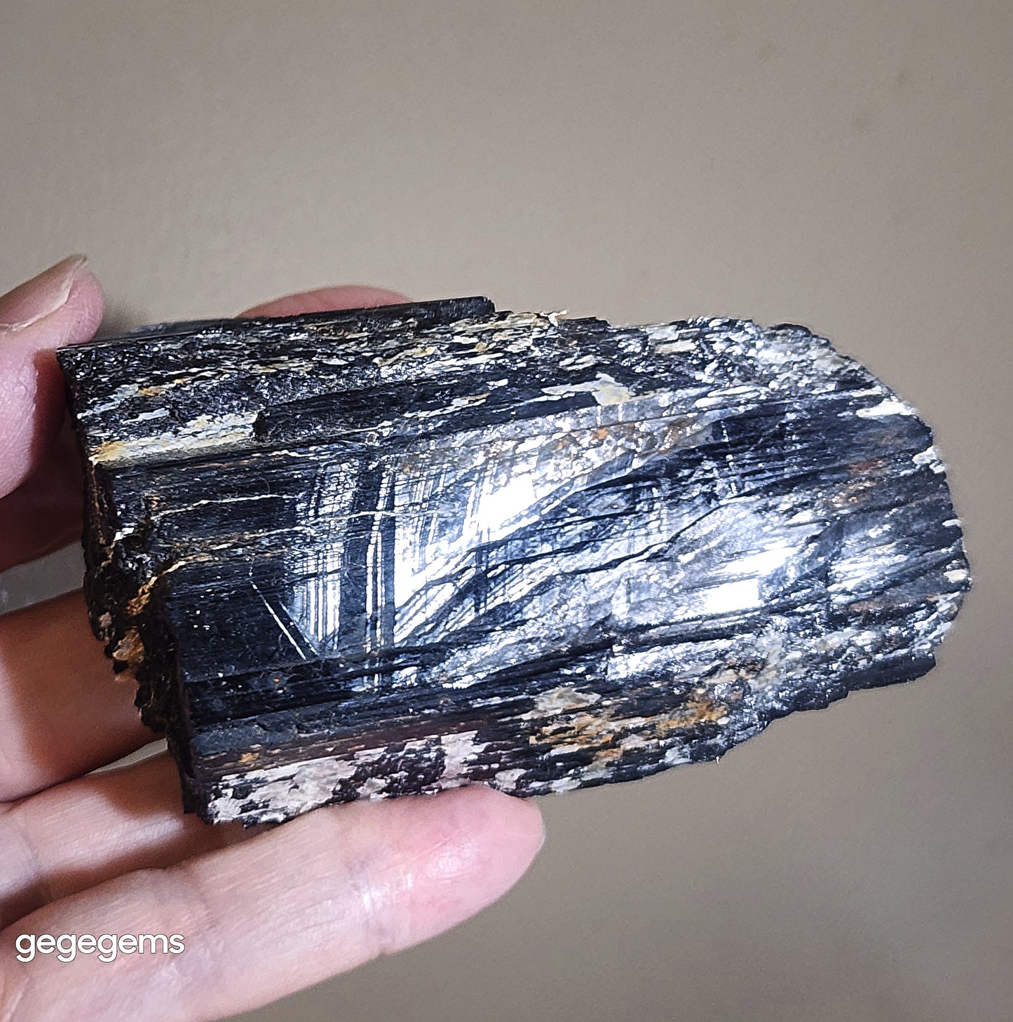 231g Raw Black Tourmaline with some silvery Mica co-growth, very reflective surface handheld decor display 天然黑碧玺原石带云母片超亮皮手把摆件