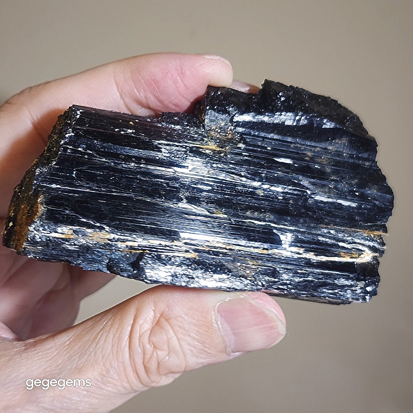 231g Raw Black Tourmaline with some silvery Mica co-growth, very reflective surface handheld decor display 天然黑碧玺原石带云母片超亮皮手把摆件