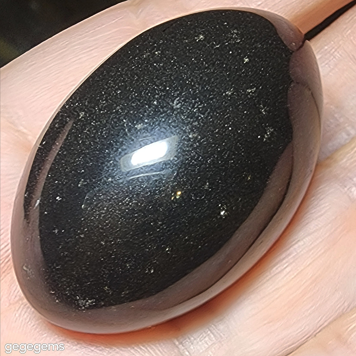4.2cm Narmada Black Shiva Lingam handheld [Natural Crystal]