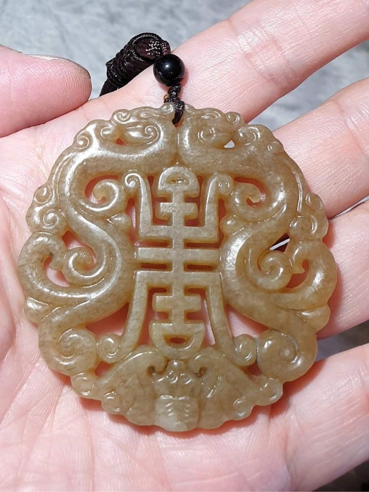 Premium caramel brown Nephrite pendant hollowed out and carved on both sides double dragons, bat and "longevity (寿) in ancient Chinese characters (with certificate) 和田玉且末全糖吊坠(镂空双面刻双龙、蝙蝠与小篆体"寿")(带证书)