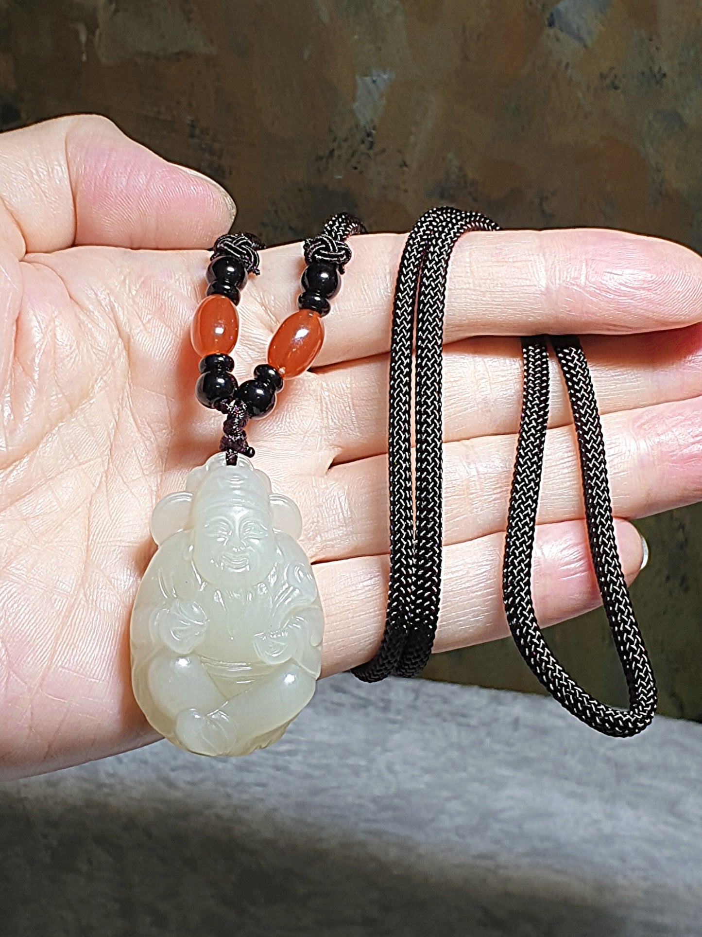 Light greenish light yellowish Nephrite with lucky "Water Wave" lines and a hint of purplish carved God of Wealth Ruyi Ingot Jade pendant (with certificate) 和田玉元宝如意财神吊坠淡黄淡绿带发财水线少许淡紫(带证书)