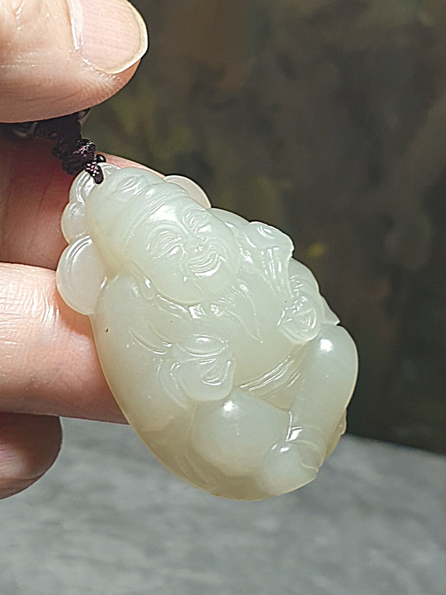 Light greenish light yellowish Nephrite with lucky "Water Wave" lines and a hint of purplish carved God of Wealth Ruyi Ingot Jade pendant (with certificate) 和田玉元宝如意财神吊坠淡黄淡绿带发财水线少许淡紫(带证书)