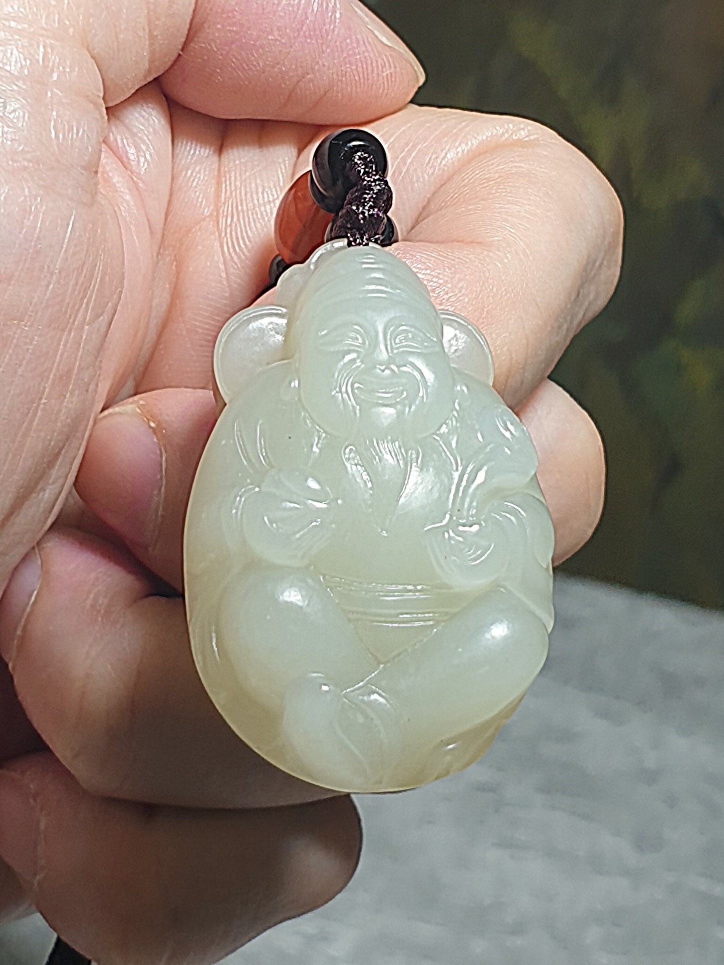 Light greenish light yellowish Nephrite with lucky "Water Wave" lines and a hint of purplish carved God of Wealth Ruyi Ingot Jade pendant (with certificate) 和田玉元宝如意财神吊坠淡黄淡绿带发财水线少许淡紫(带证书)