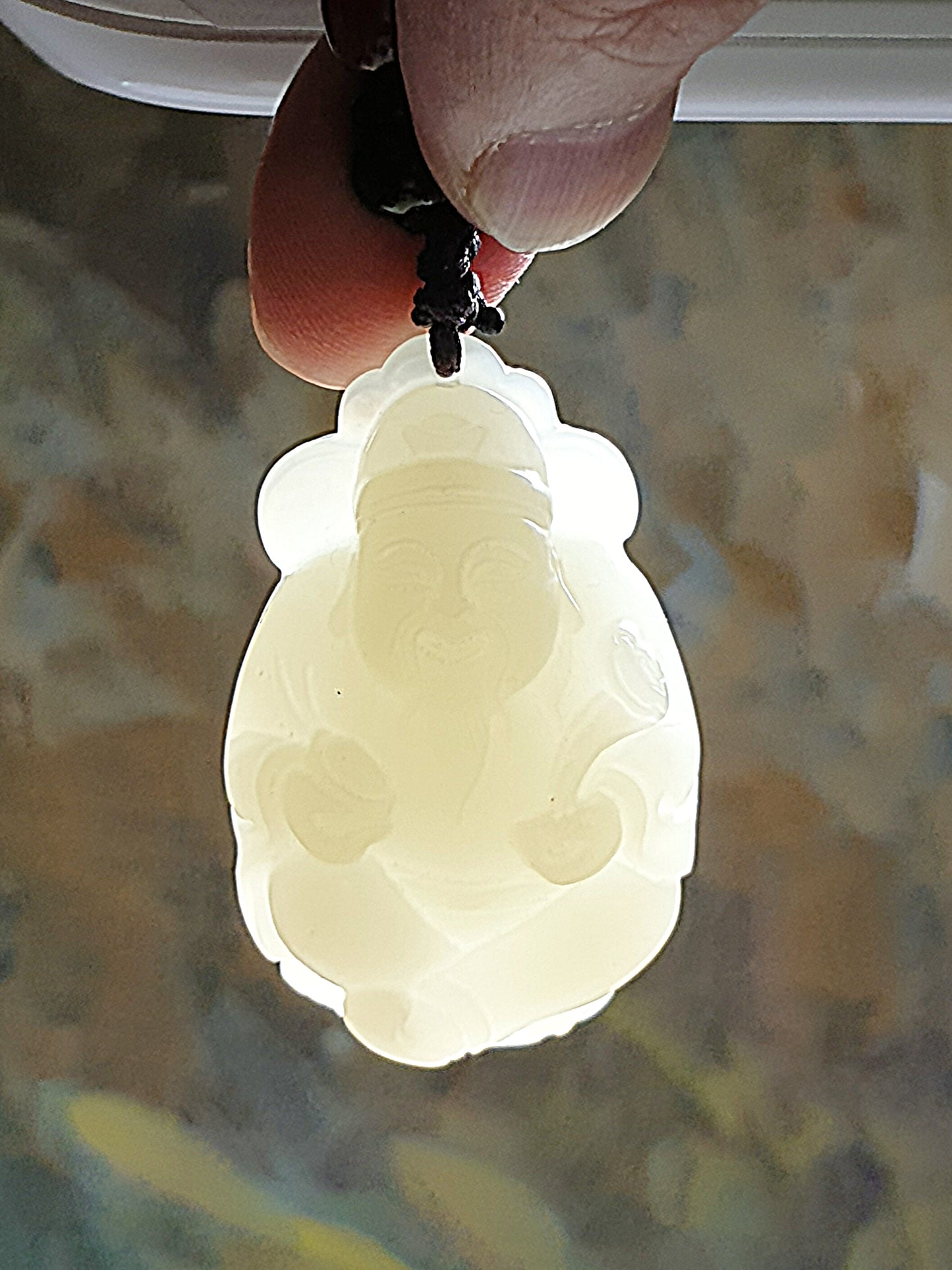 Light greenish light yellowish Nephrite with lucky "Water Wave" lines and a hint of purplish carved God of Wealth Ruyi Ingot Jade pendant (with certificate) 和田玉元宝如意财神吊坠淡黄淡绿带发财水线少许淡紫(带证书)