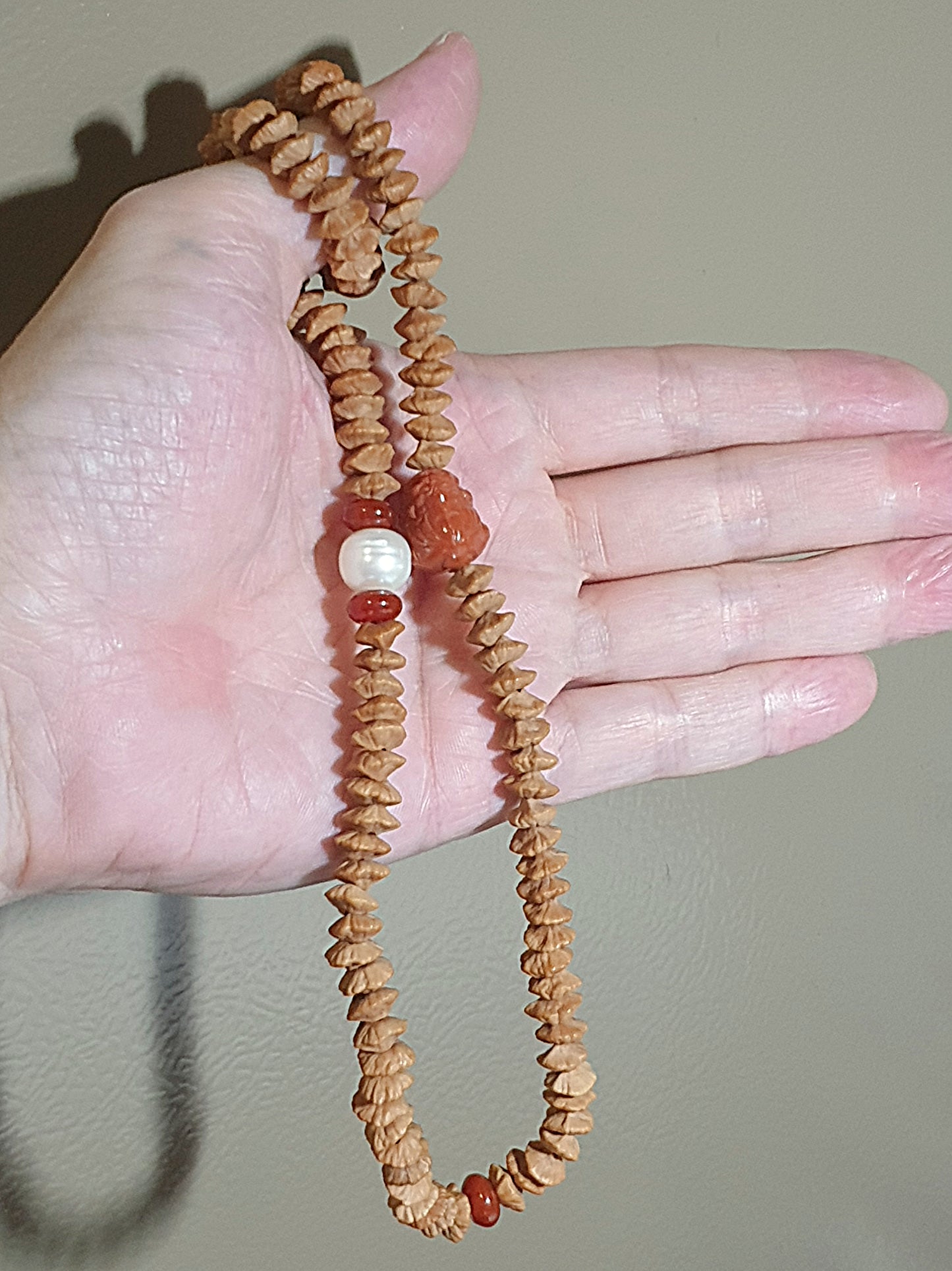 8.3mm "Double sides Lotus" seed (Gold Leaf Bodhi) 108 mala 2 rounds bracelet with natural Fresh Water Pearl and Nan Hong Pi Xiu & abacus beads  8.3毫米天然双面莲花(又名钱串子、金叶菩提、金钱菩提、招财纳福)108念珠绕手两圈手链配天然淡水珍珠、南红貔貅与算盘子