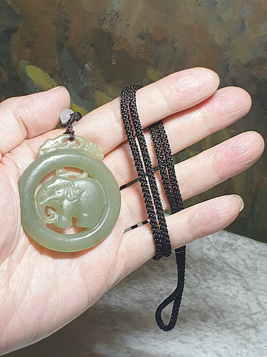 Premium Nephrite light greenish with some caramel brownish dots hollowed out & double-side carved Elephant Jade pendant (with certificate)和田玉且末青白带小许糖沁镂空双面雕刻大象吊坠(带证书)