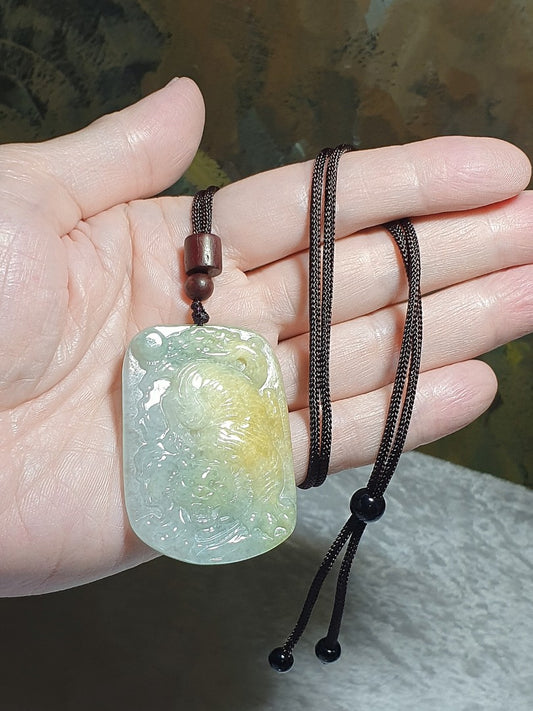Type A Yellow Jadeite light bluish greenish two tones Tiger Jade pendant (with certificate) [Natural crystal] 翡翠纯天然黄翡淡蓝绿双色庚虎吊坠(带证书) 猛虎下山, 声威震天下。